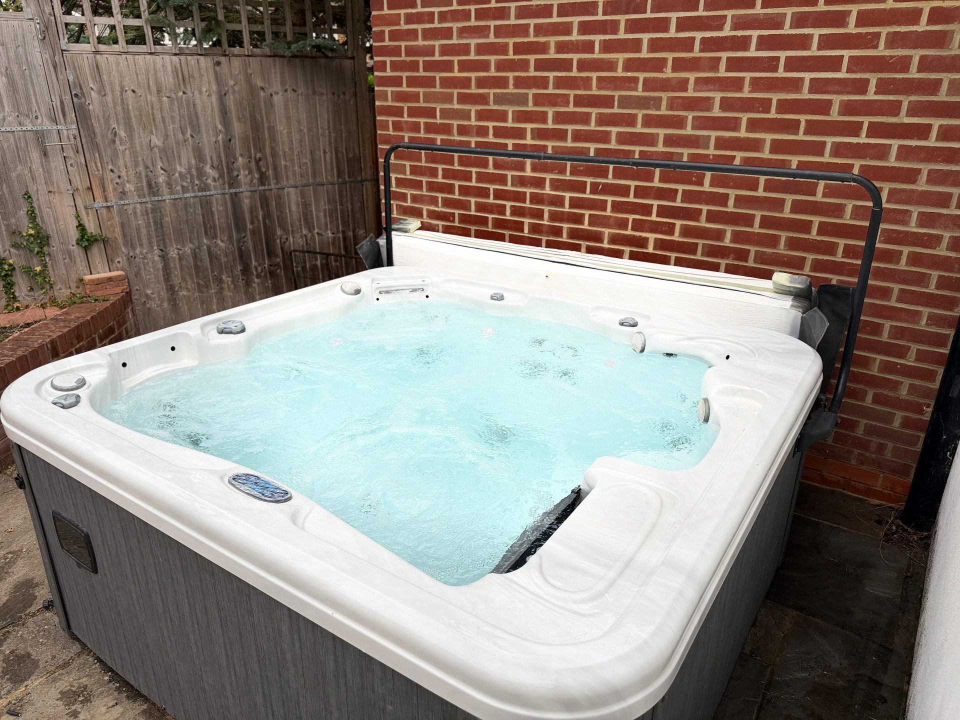 Borkwood Way private hot tub bubbling on the patio