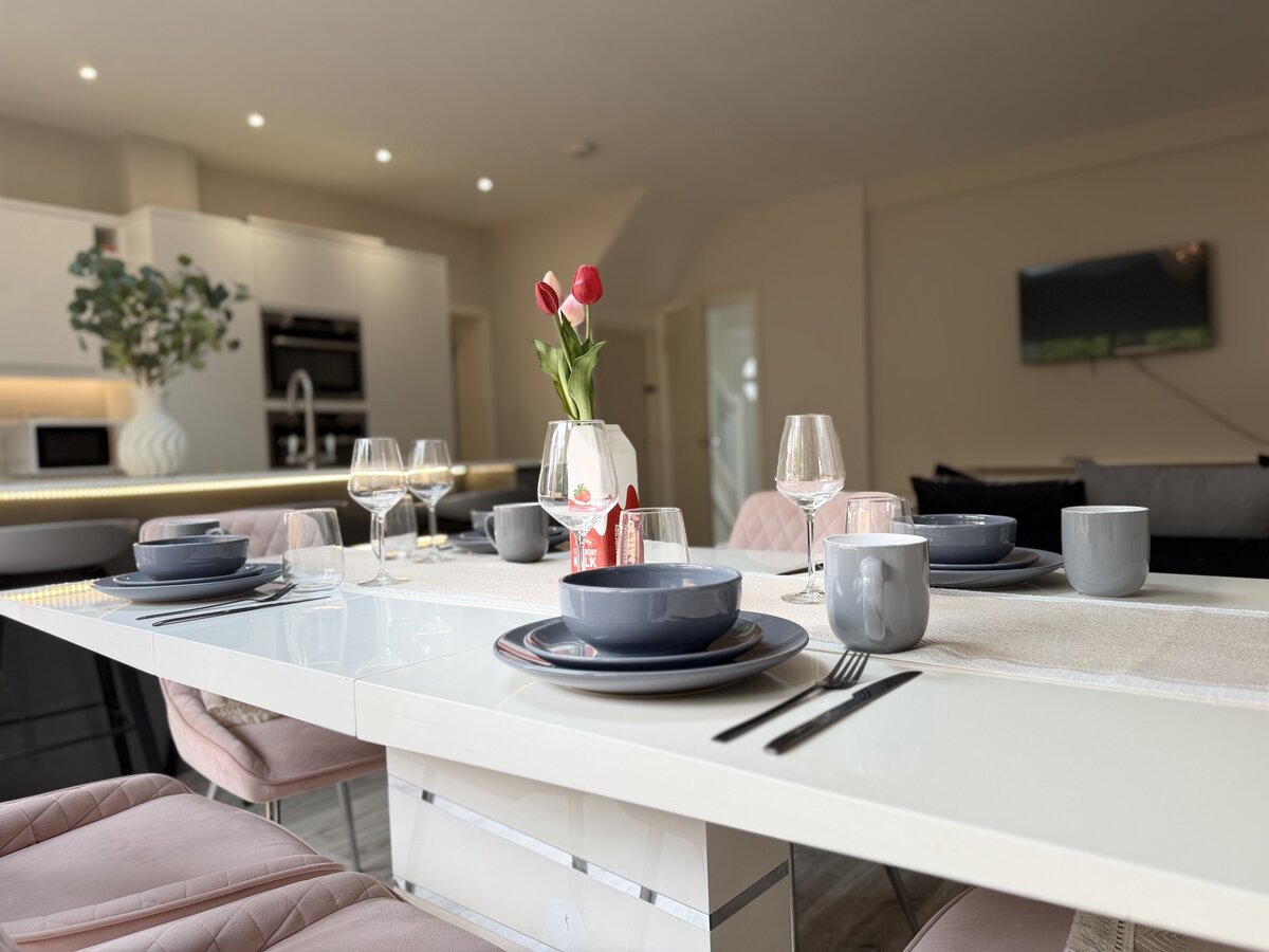 Professionally styled short-let apartment dining and kitchen space managed by Blue Flame Stays
